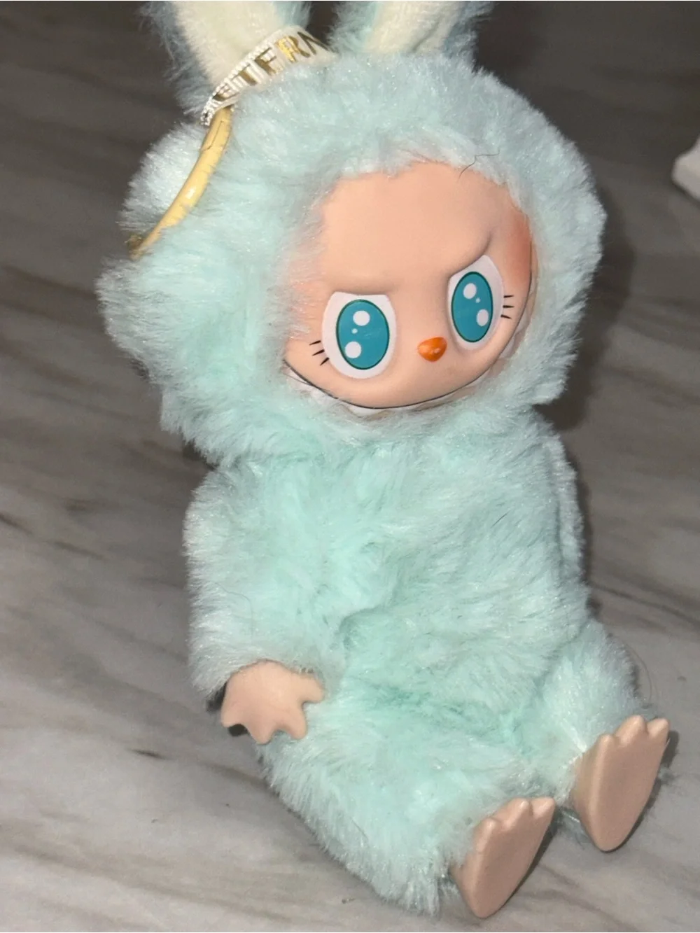 Labubu Monster have seat light blue keychain character Ququ